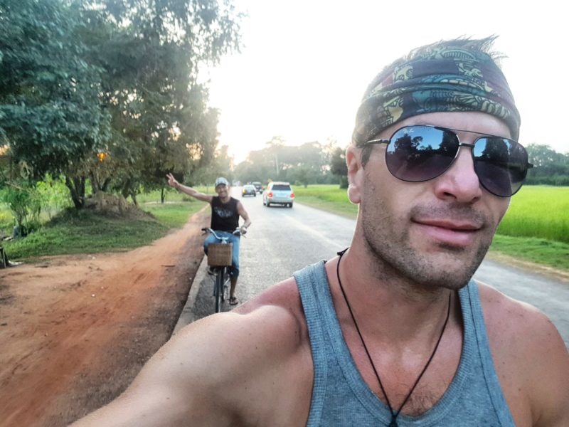 Michal Košátko biking around Angkor temples, Cambodia