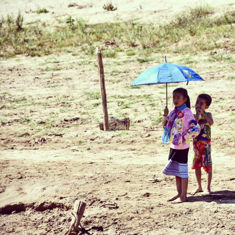 Children at the Mekong river, Laos