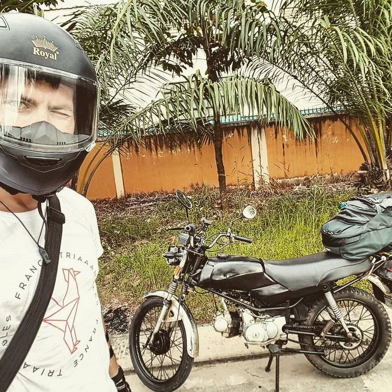 Michal Košátko with his motorbike on the way from HCMC to Hanoi, Vietnam