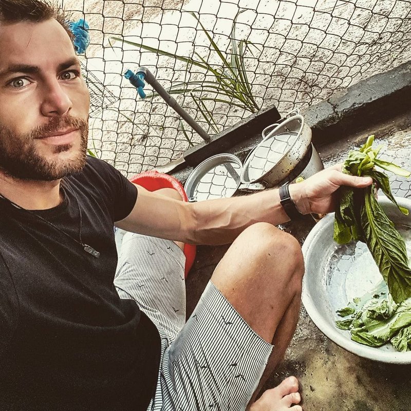 Michal Košátko preparing breakfast at the village, Vietnam